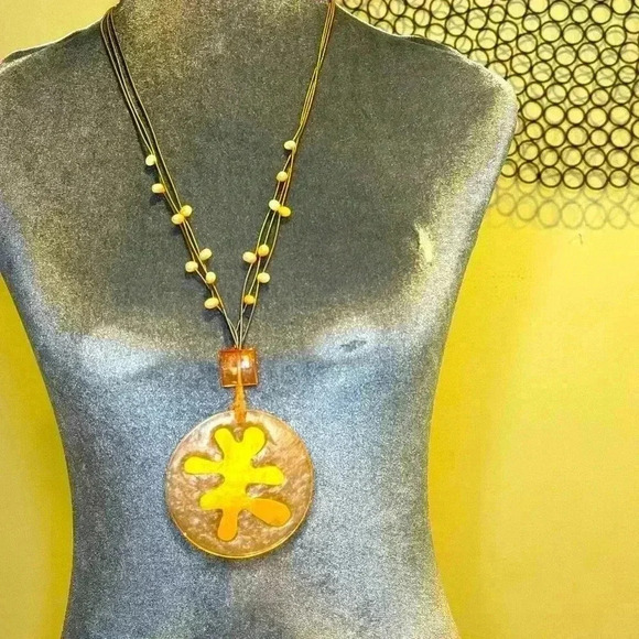 Necklace- Statement piece necklace. Piano wire string w/ gold leaf medallion. - Picture 1 of 4